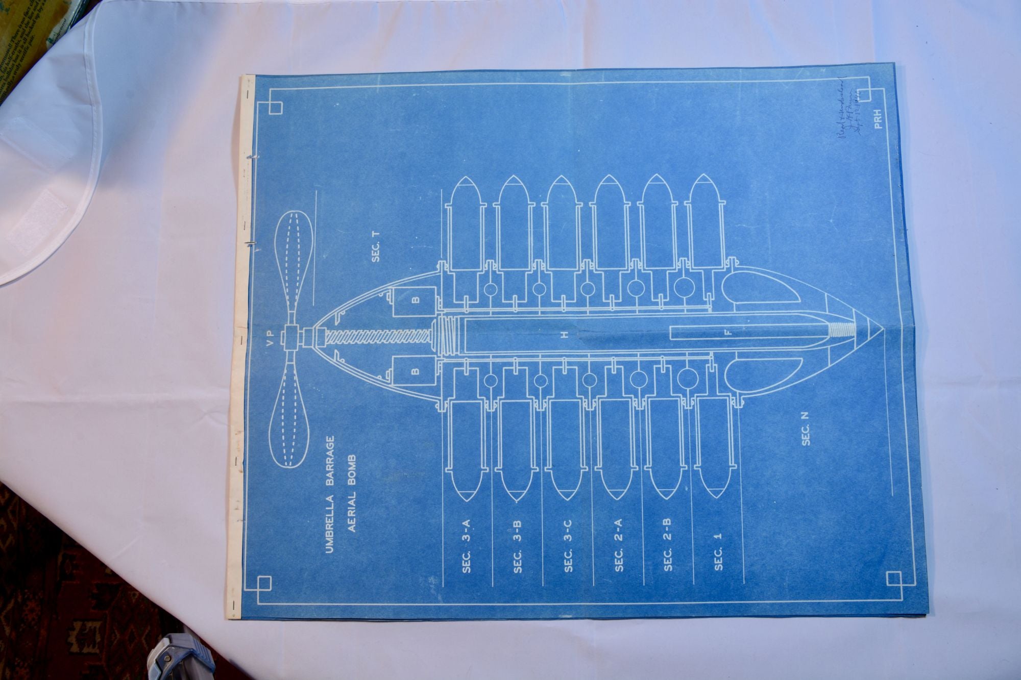 Item #9260 Designs for an "Umbrella Barrage Aerial Bomb" PRH monogram, J. H. Payne, Received.